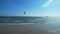 Someone doing kitesurfing in the vibrant waters of Ballymona Beach near Ballycotton, Cork, Ireland