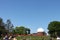 Someone takes a phone photo of graduates filing in front of observatory at Wesleyan University Graduation Middletown Conneticut US