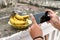 Someone takes a picture of a banana with their mobile phone