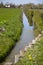 Somerset river with barrier to protect the bank