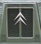 Somerset UK. October 2019. Retro Citroen logo on the front grille of a retro green Citroen van.