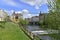 Somes river, bridge, river bank and historical buildings in Cluj-Napoca