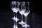 Sommelier, cavist. 4 empty wine glasses on a dark background. Wine school. Tinted.