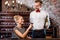 Sommelier with young woman on degustation in the