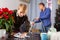 Son helps his father to clean room before christmas