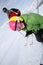 Son and his father skiing the slopes