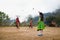 Son La, Vietnam - Jan 13, 2016: Ethnic H`mong children in traditional clothes throwing Con ball - the traditional game on playgro