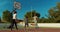 Son playing passing basketball with father and mother.