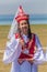 SONG KOL, KYRGYZSTAN - JULY 25, 2018: Traditional dress wearing girl during the National Horse Games Festival at the