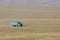 Song Kul, Kyrgyzstan, August 8 2018: A truck drives through the steppe at Song Kul Lake in Kyrgyzstan