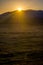 Song Kul lake with horses in sunrise