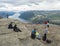 Songesand, Norway, September 9, 2019: Group of tourist people admiring beautiful view and posing at Preikestolen massive