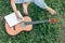 Songwriter create and writing notes,lyrics in the book grass at parks