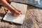 Songwriter create and writing notes,lyrics in the book on stone at parks