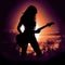 Sonic Serenade: Captivating Silhouette of a Female Guitar Virtuoso