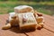 sonpapdi and nuts on wooden table or blurry background