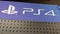 Sony PlayStation 4 home video game console text logo and brand sign ps4 from Sony