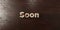 Soon - grungy wooden headline on Maple - 3D rendered royalty free stock image