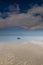 A soothing picture of the wadden sea at paesens moddergat, big rock in foreground, sea and sky