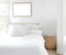Soothing Serenity: Aesthetic Mockup of a Cozy Minimalist Bedroom with Wood Floor and White Walls