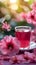 Soothing tea moment Cup of hot hibiscus tea with floral ambiance