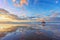 Sopelana beach at sunset with couds reflections