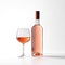 A sophisticated glass of rose wine with a bottle, created by Generative AI