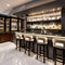 A sophisticated home bar with a marble-topped counter, glass shelves displaying a collection of fine spirits, and elegant bar st