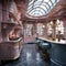 a sophisticated pink kitchen with a glass skylight above, providing an abundance of natural light