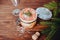 Sophisticated salad with champagne, parmesan and fork on a wooden background