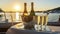 A Sophisticated Sunset Soiree on the Ocean, Featuring a Pristine Champagne Bottle in an Ice Bucket with Crystal Glasses, Onboard a