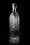 Sophisticated Unbranded Glass Bottle in a Velvet Embrace