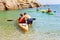 Sorrento/Italy - 20 August 2018: Kayaking and Canoeing School. Professional instructor teaching a beginner