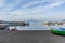 Sorrento, Italy - April 1, 2017: The fisherman boats in beautiful sea in south Italian coastal village with the Vesuvio volcano i