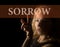 Sorrow written on virtual screen. hand of young woman melancholy and sad at the window in the rain.