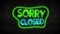 Sorry Closed Neon Light on Brick Wall. Night Club Bar Blinking Neon Sign