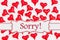 Sorry message with red hearts on white fabric
