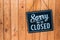 Sorry we\\\'re closed sign. grunge image hanging