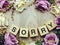 Sorry word wooden block with artificial roses flowers decor and gift box