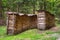 Sorted wood log under a shed