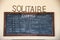 Sossusvlei, Namibia; 08182016: Blackboard with rainfall record handwritten at Solitaire Country Lodge