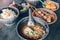 Soto Batok. Javanese beef clear soup with bean sprouts and rice; served in a traditional bowl made of coconut shell.