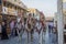 Souk Waqif in Doha Qatar main street day light view with traditional guards riding horses and people