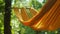 The sound of rustling leaves and chirping birds lulling you to sleep in a suspended hammock swaying gently in the breeze