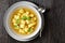 Soup of chicken broth with parmesan egg dumplings