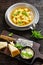 Soup of chicken broth with parmesan egg dumplings