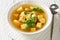 Soup of chicken broth with parmesan egg dumplings