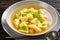 Soup of chicken broth with parmesan egg dumplings