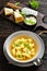 Soup of chicken broth with parmesan egg dumplings