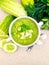 Soup cucumber in white bowl on granite table top